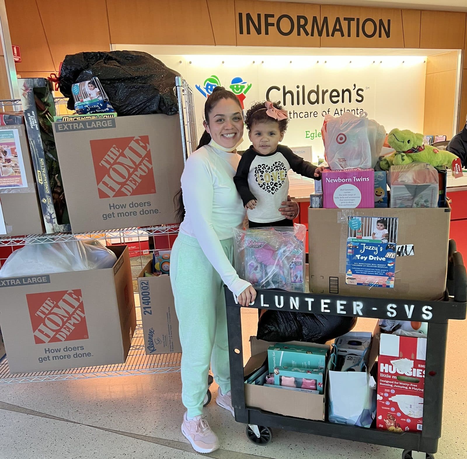 Volunteers delivering donations for one of Jazzy's Toy Drives at Children's Healthcare of Atlanta